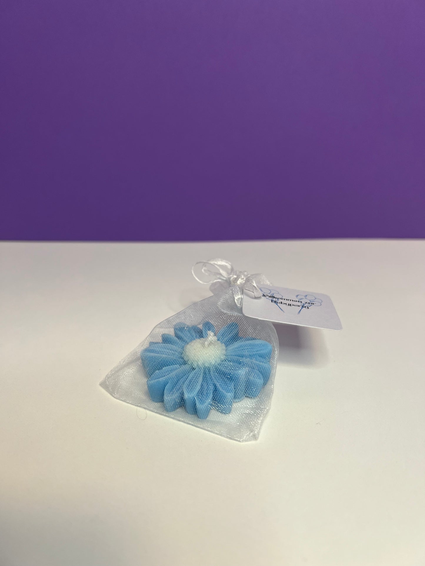 Baby Shower Blumen-Kerze in der Farbe blau